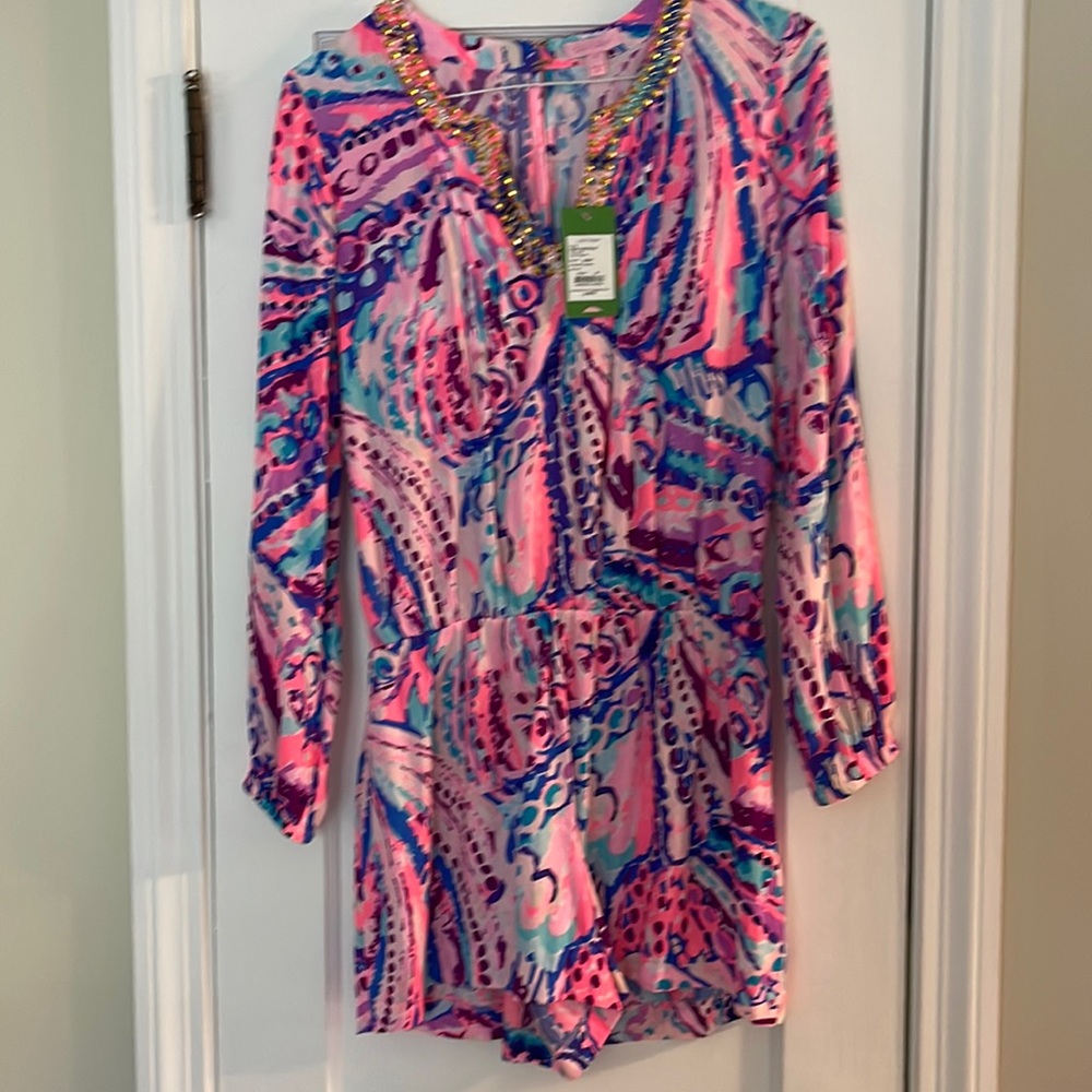 Never worn with tags colorful Lilly Pulitzer romper. Just in time for summer!